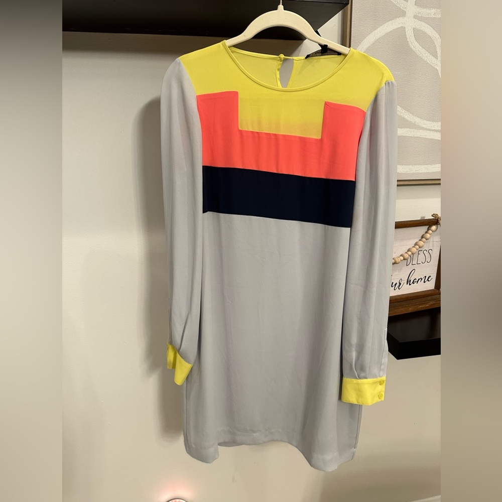 Cute medium length dress. It’s light weight with long sleeves which I love.